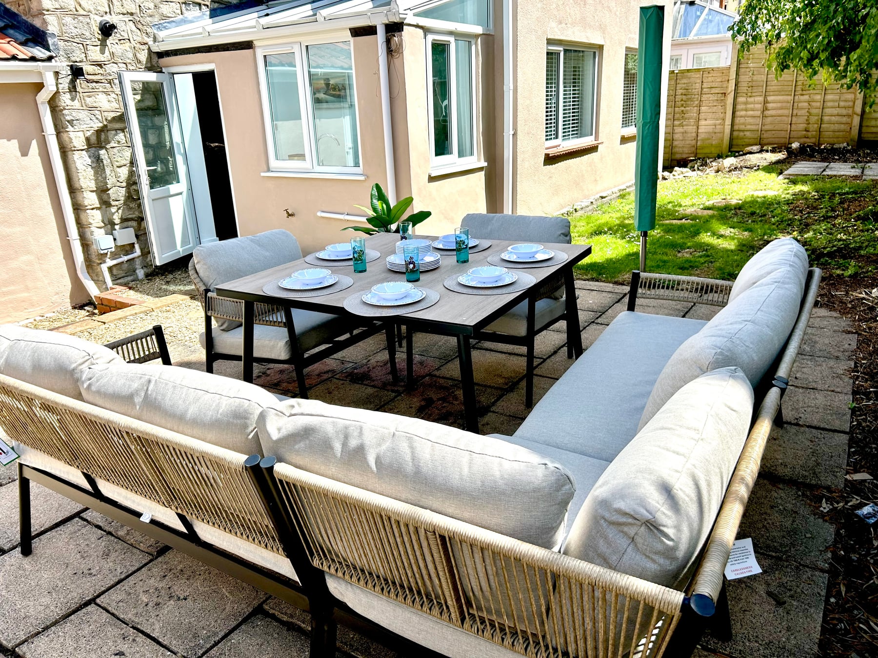 Outdoor dining table and comfortable garden seating