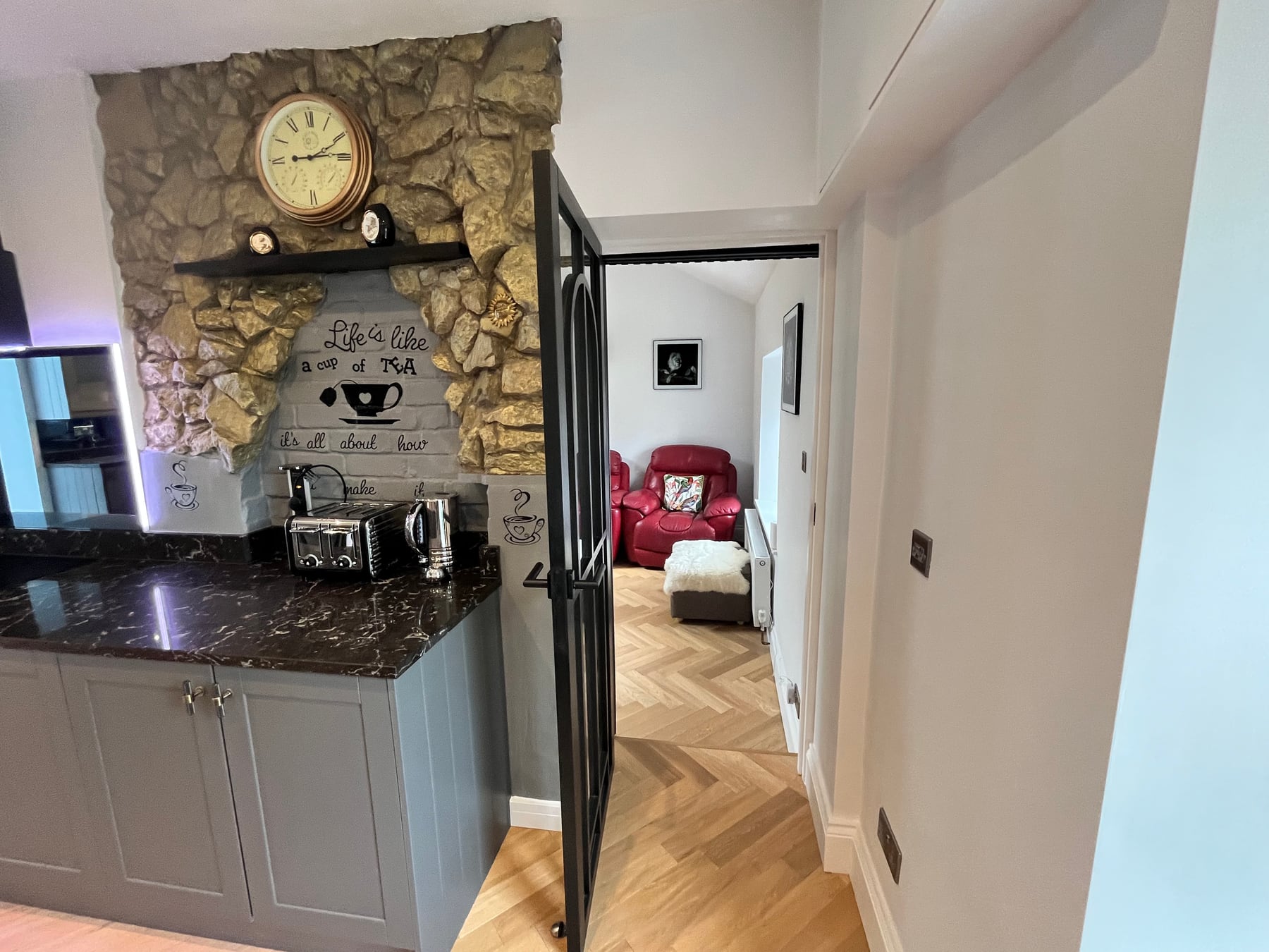 Kitchen leading through to the snug at Sweet Cottage